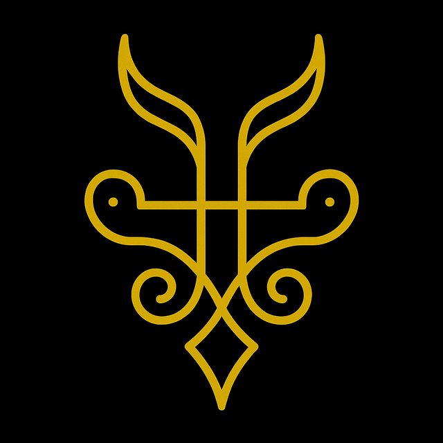 A golden sigil for “Theistic Satanism: Worshiping Satan as a Real Deity,” featuring a horned crown-like top, a central vertical stem, and symmetrical curling lines forming an occult emblem on a black background.