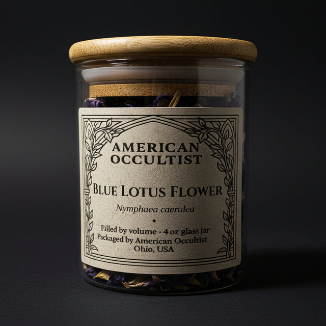 Glass jar with wooden lid labeled 'American Occultist Blue Lotus Flower' on a neutral background.