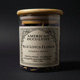 Dried blue lotus flower (Nymphaea nouchali var. caerulea) in a labeled glass ritual herb jar