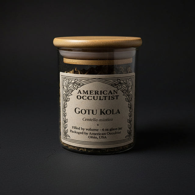 Jar with gotu kola and a wooden lid on a marble surface