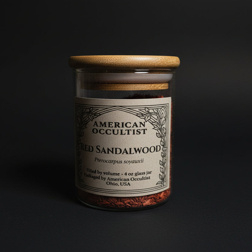 Wildcrafted cut-and-sifted red sandalwood wood (Pterocarpus soyauxii) in a labeled glass ritual herb jar