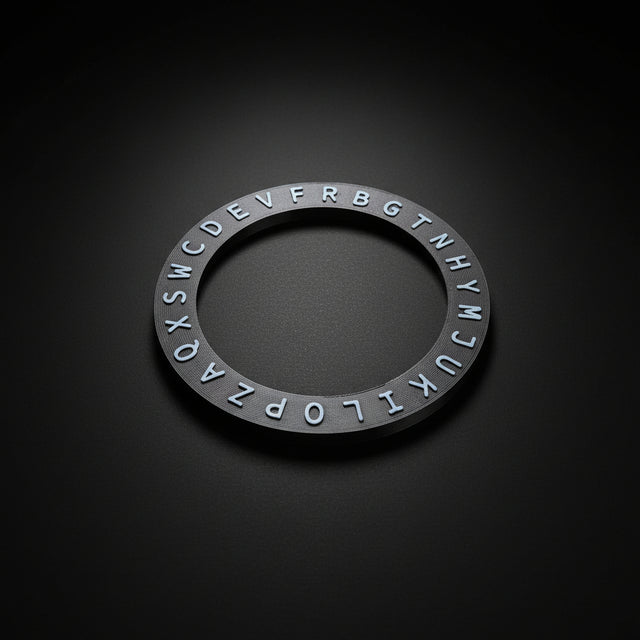 Sigil Forge Cypher Edition black plastic ring on a black surface