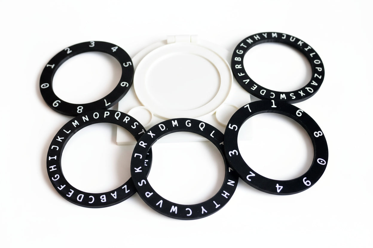 Black rings with letters and numbers on a white background