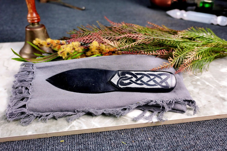 Close-up of Black Soapstone Athame showcasing Celtic engravings on the handle and black soapstone blade