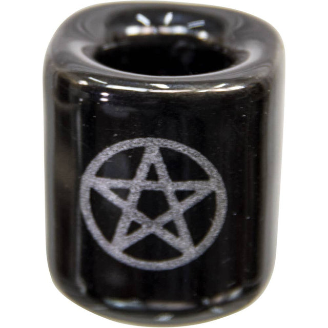 Black ceramic holder with pentagram design on a white background