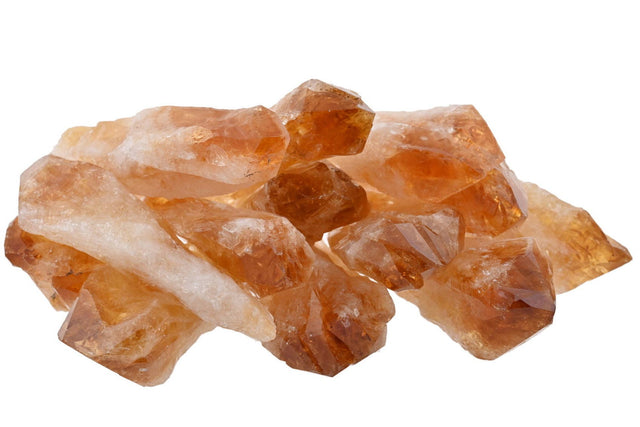 Cluster of orange crystals on a white background