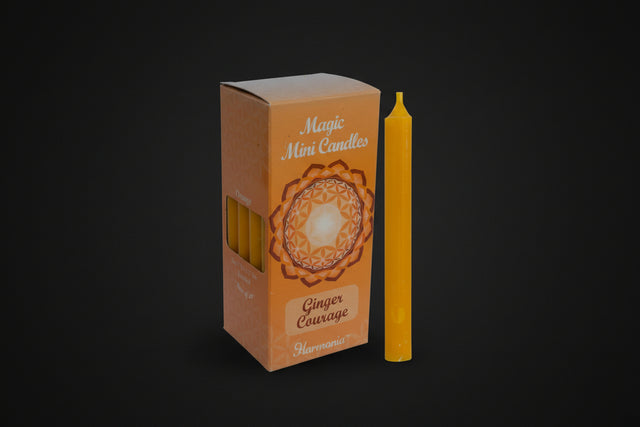 Orange 'Magic Mini Candles' with packaging labeled 'Ginger Courage' by Harmonia on a white background.