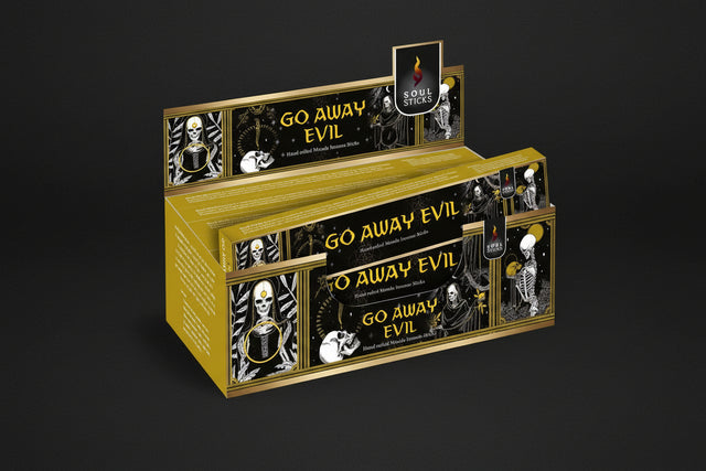 Box of 'Go Away Evil' incense sticks with decorative design and text.