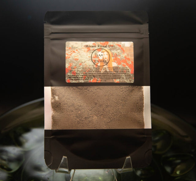 Black bag with a label featuring text and graphics on a dark background