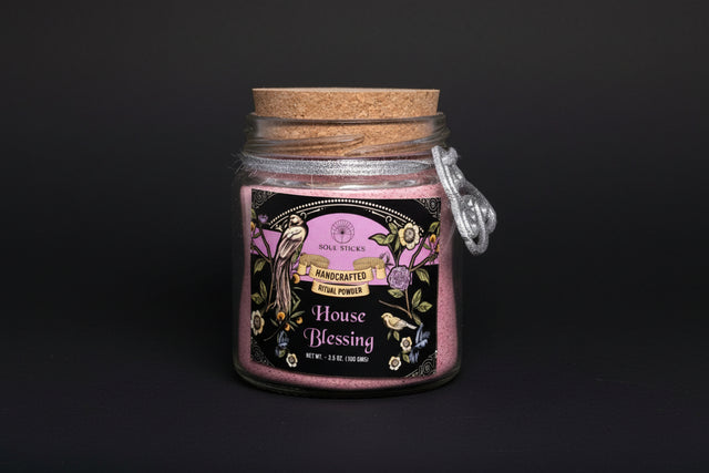 Glass jar with cork lid labeled 'House Blessing' from 'Soul Sticks' on a white background
