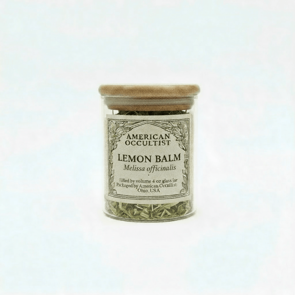 Jar of lemon balm with a wooden lid on a white background