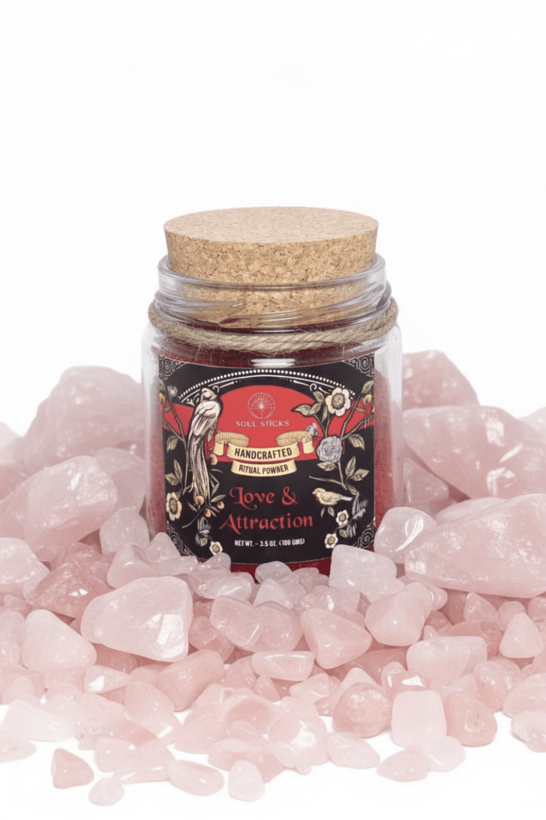 Jar of rose petals with a label on pink stones