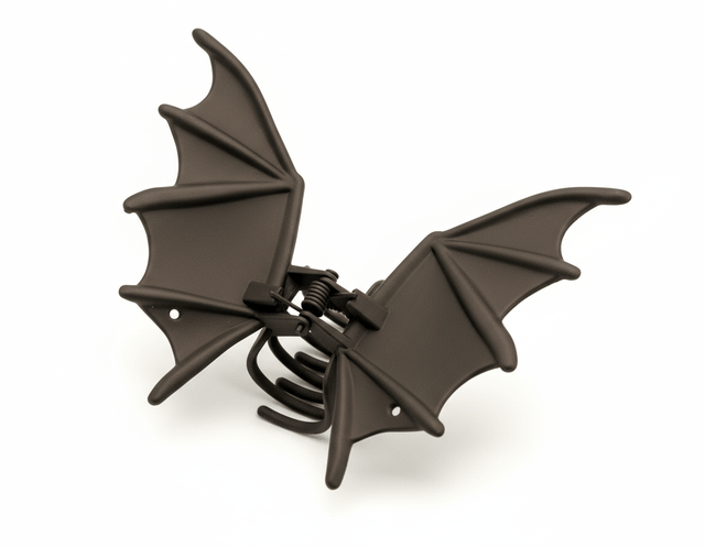 Brown bat-shaped clip on a white background