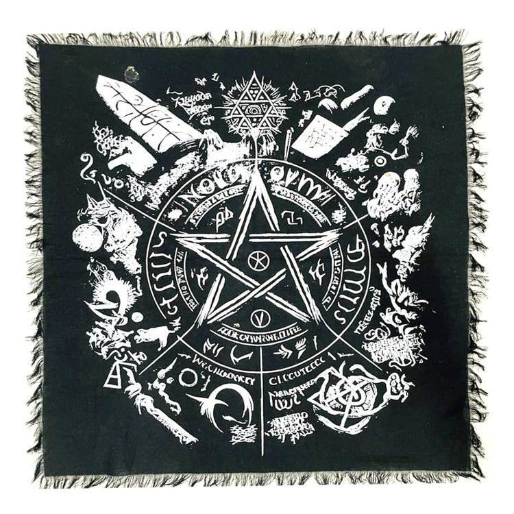 Black square altar cloth with white symbols and designs, including a pentagram, on a white background.