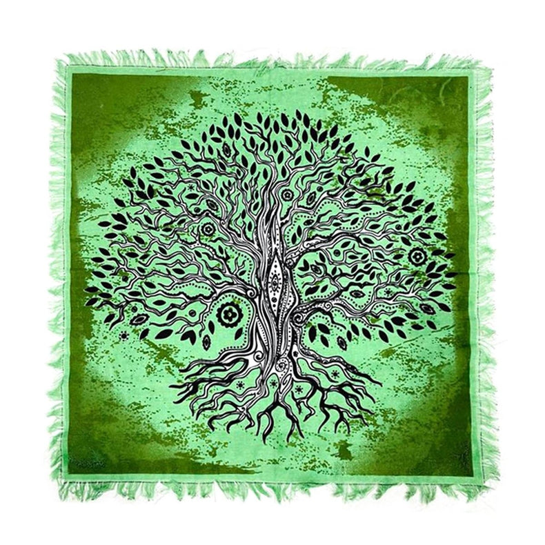 Green fabric with a black tree of life design