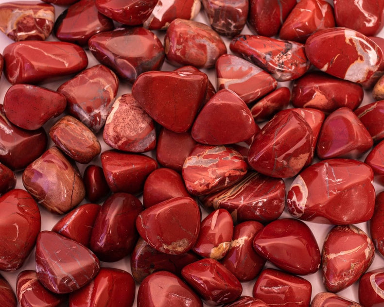 Close-up of red stones with a focus on texture and color.