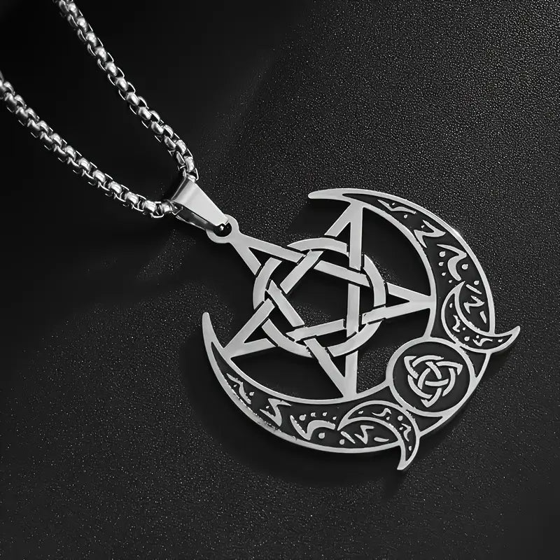 Silver pentacle and crescent moon pendant on a black background