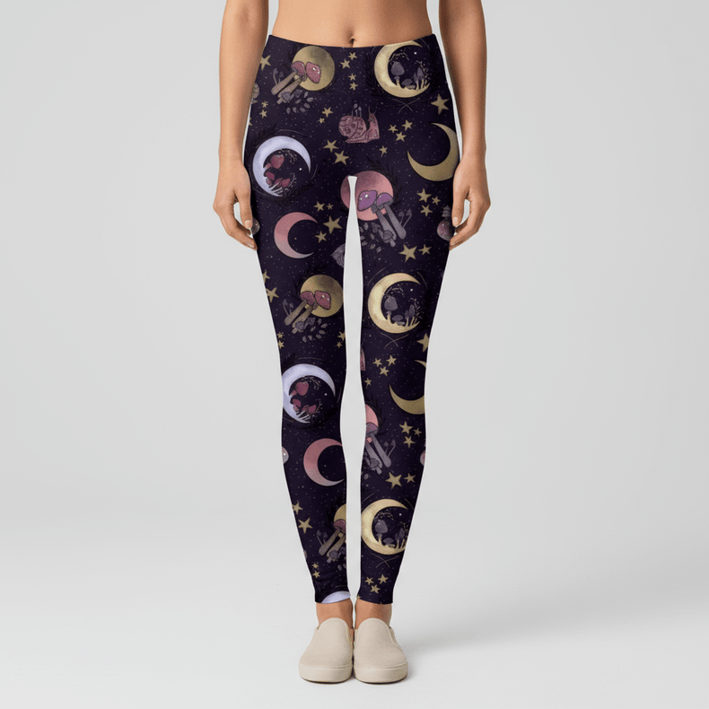 Leggings with celestial pattern worn by a person on a plain background