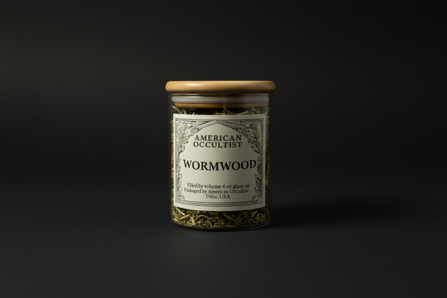 Wormwood in a jar with a dark background.
