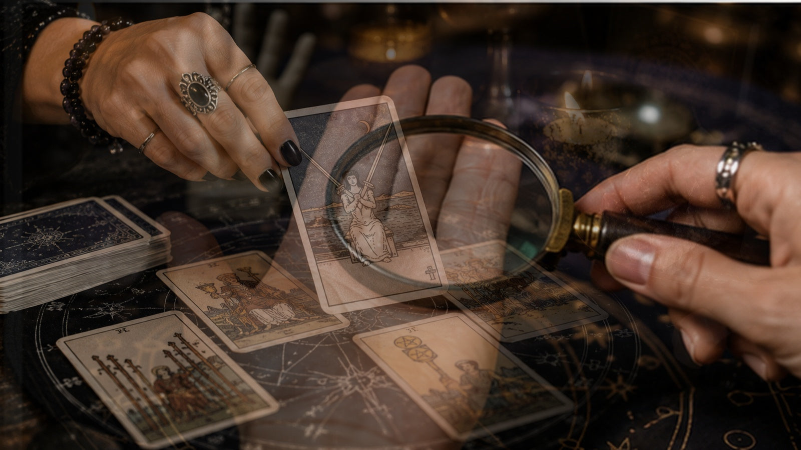 Tarot cards and an open palm arranged together for planning thoughtful questions before a reading.