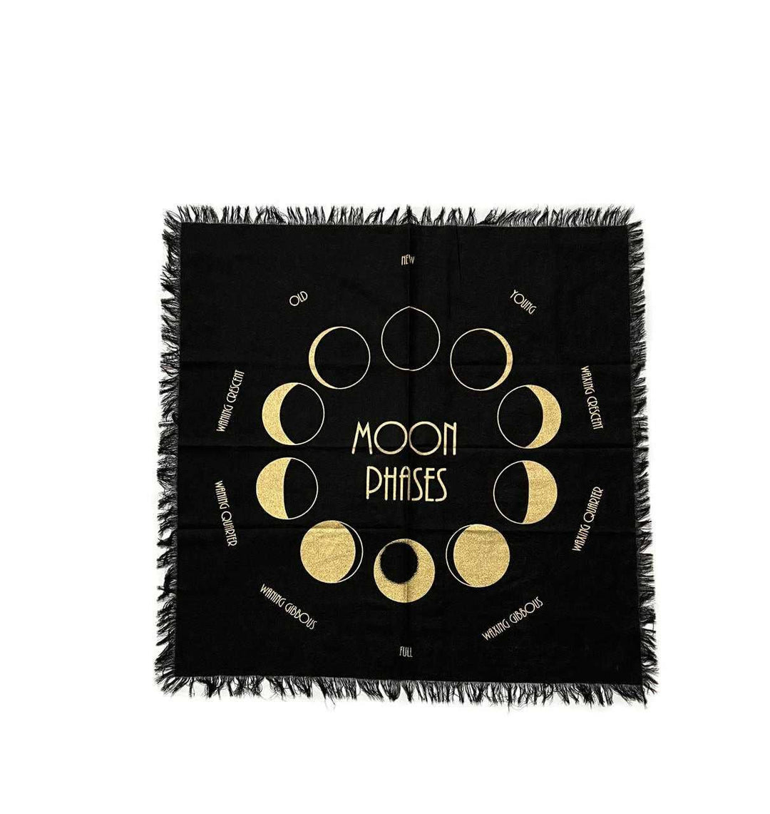 Moon magic for beginners featuring a moon phase altar cloth for lunar rituals, journaling and divination