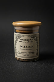 Jar of dried dill seed (Anethum graveolens) with a wooden lid.