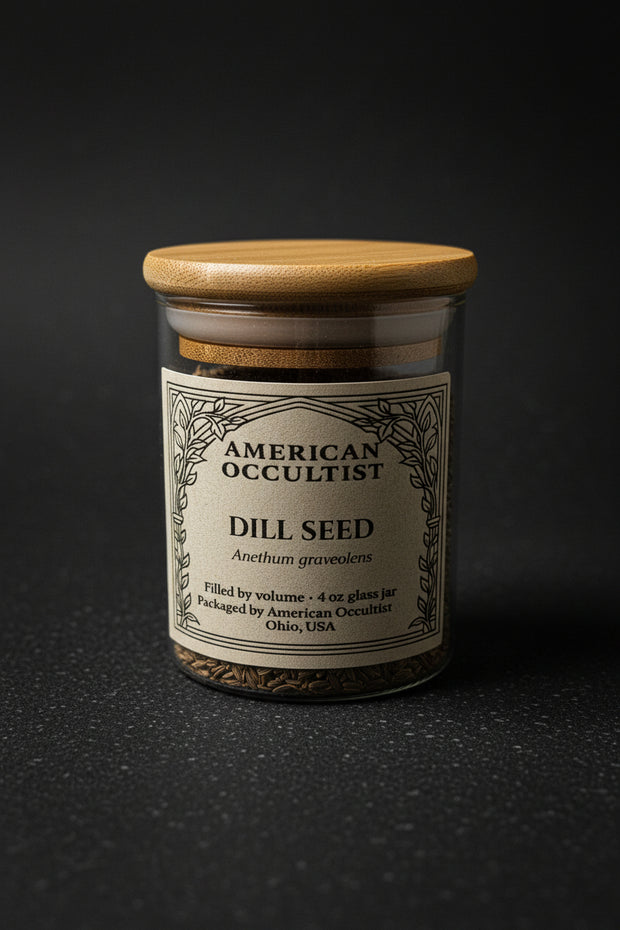 Jar of dried dill seed (Anethum graveolens) with a wooden lid.