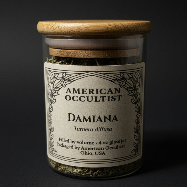 Glass jar with wooden lid containing Damiana leaves, labeled 'American Occultist'.