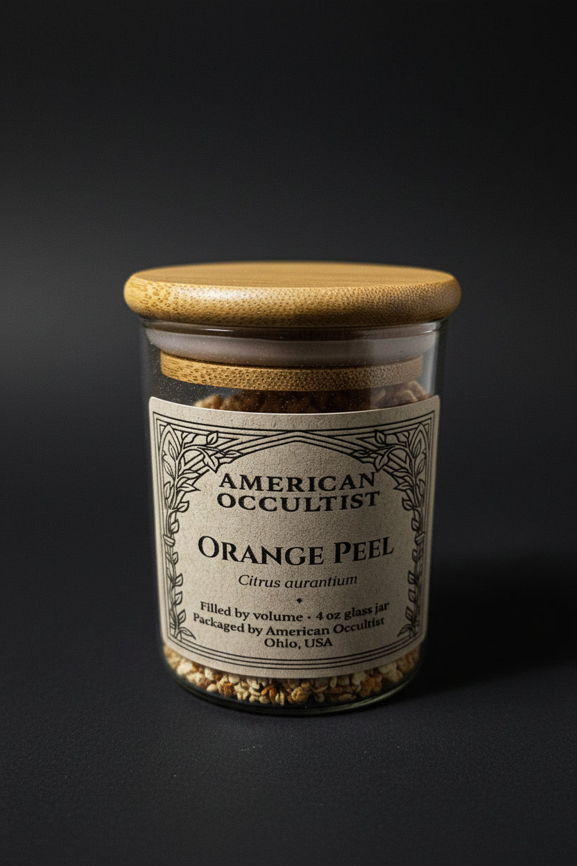 Certified-organic dried sweet-orange peel (Citrus sinensis) in a labeled glass ritual herb jar