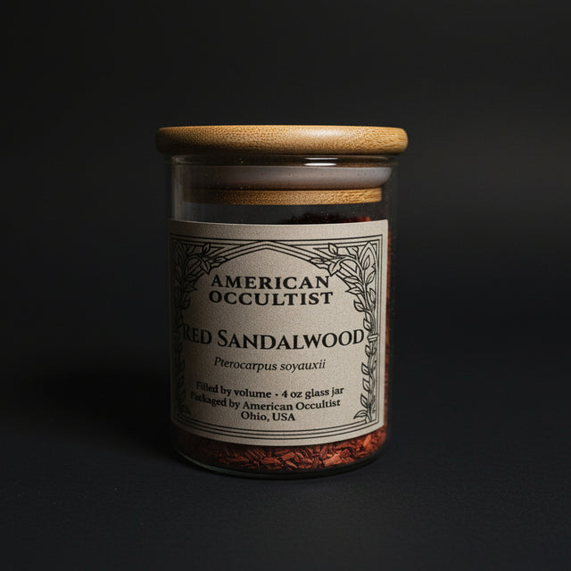 Red sandalwood ritual wood in 4 oz glass jar with bamboo lid labeled American Occultist.