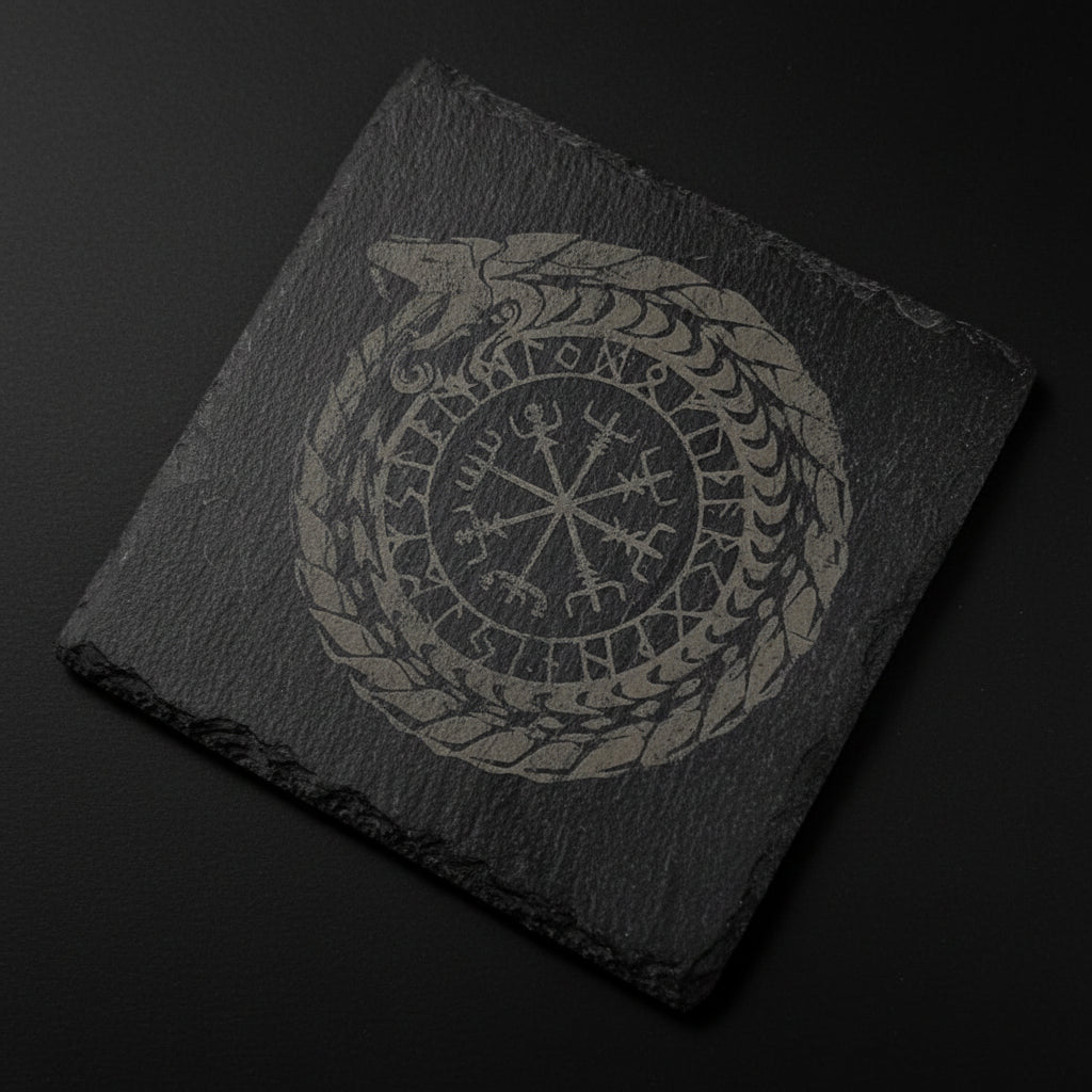 square slate altar tile engraved with Nordic ouroboros and runic-style symbol used as a ritual surface.