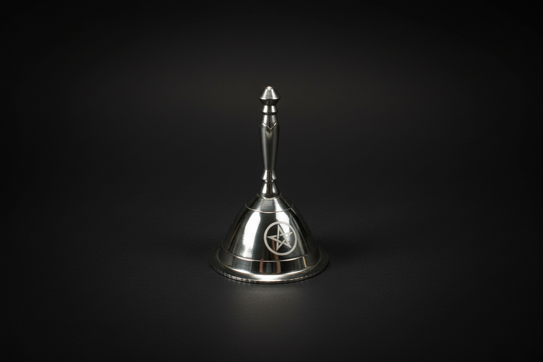 Painted brass ritual bell with pentacle design