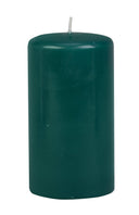 Green 3×6 pillar candle on dark altar, unscented ritual pillar for prosperity and growth