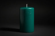 Green 3×6 pillar candle on dark altar, unscented ritual pillar for prosperity and growth