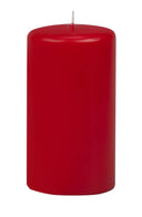 Red candle on a white background