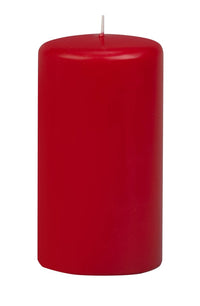 Red candle on a white background