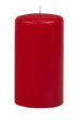 Red candle on a white background