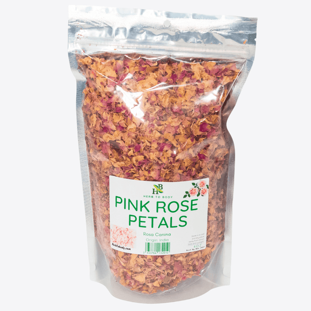 Bag of pink rose petals with a label on a white background