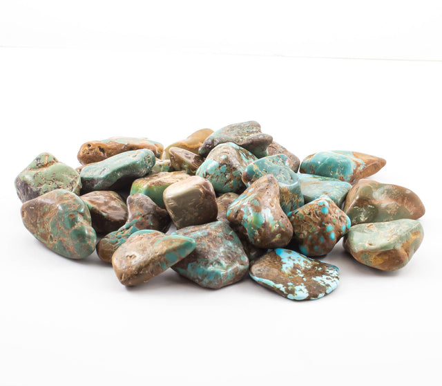 Polished blue-green stones sold as Turquoise with dark matrix