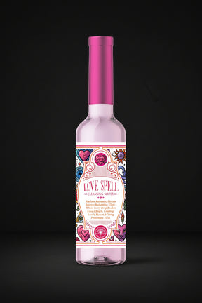 One bottle with colorful label and pink cap on a black background