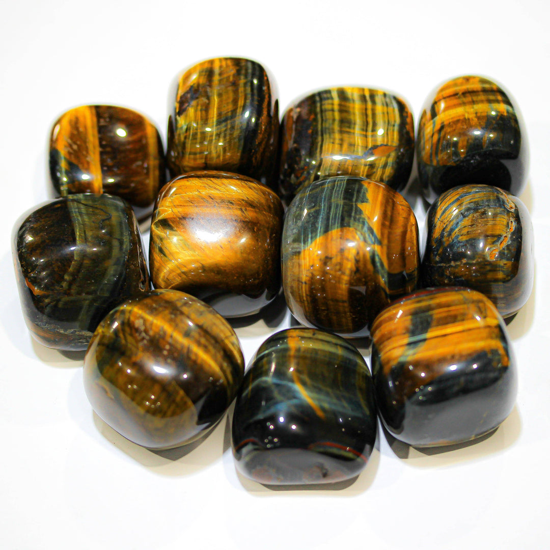Polished Blue Tiger Eye stones with blue-gray chatoyant banding