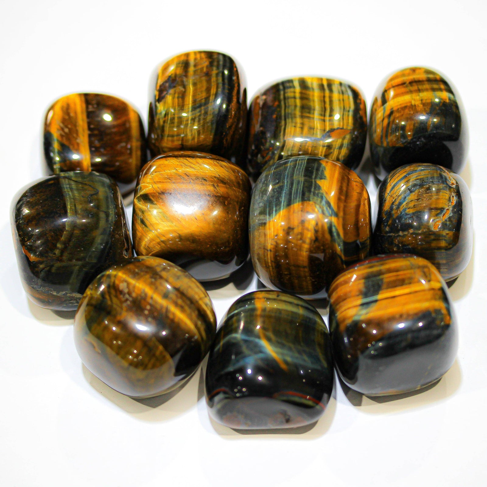 Polished Blue Tiger Eye stones with blue-gray chatoyant banding