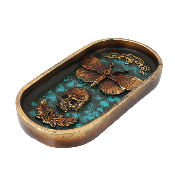 Moth and skull incense burner side view