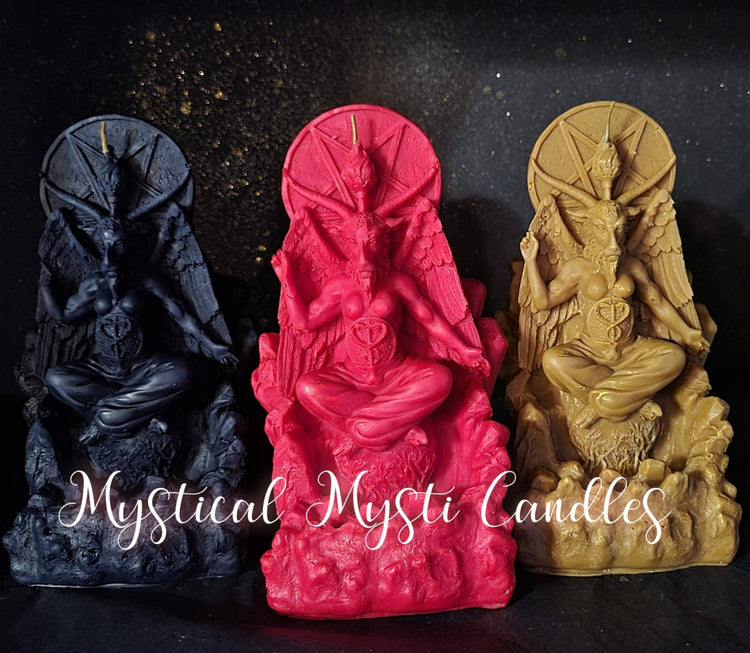 Three candle sculptures in black, red, and gold with 'Mystical Mysti Candles' branding.