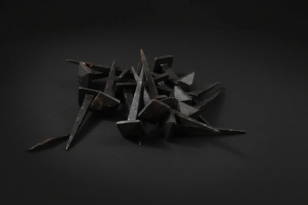 Hand-forged black iron ritual spikes with 7/8-inch square heads
