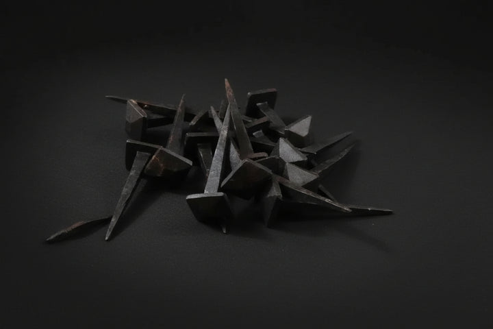 Hand-forged black iron ritual spikes with 7/8-inch square heads