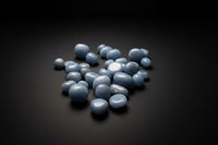 Representative pale-blue stones sold as Angelite; white patterning, shape, polish, and size vary