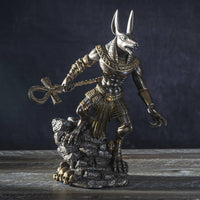 Statue of a Egyptian deity with a dark background