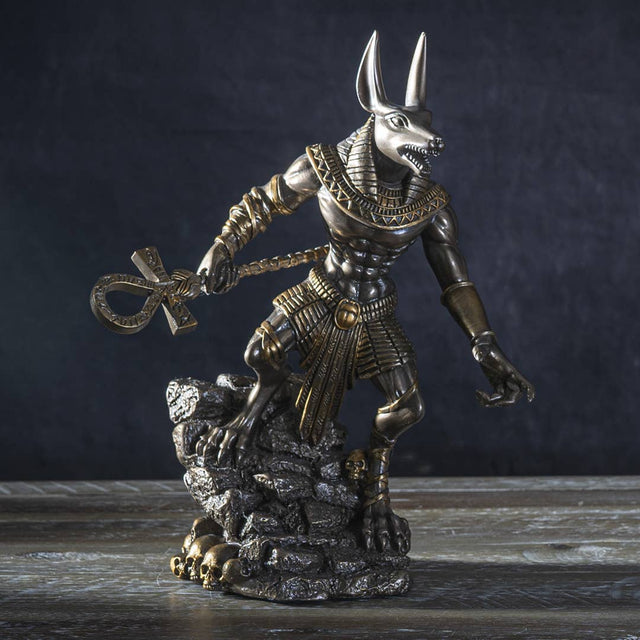 Statue of a Egyptian deity with a dark background