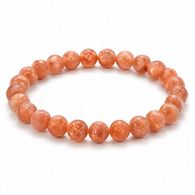Arusha Sunstone beaded stretch bracelet with warm orange and coppery gemstone beads on a white background